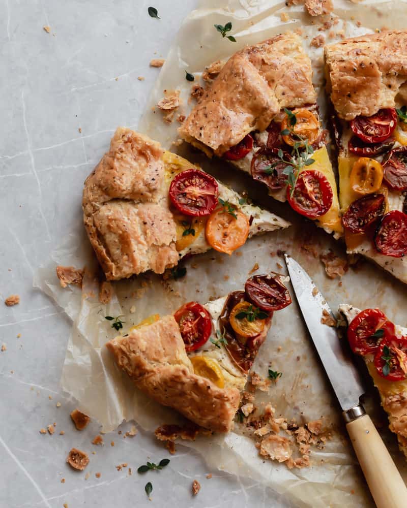 Baked heirloom tomato galette with crispy and flaky cornmeal crust